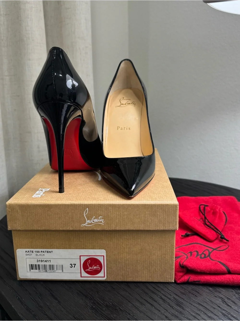 Christian Louboutin Black Patent Leather Pumps with Red Soles
